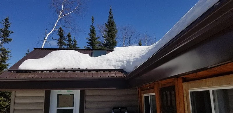 S-5! ColorGard snow retention on a metal roof